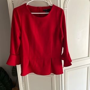 Vibrant red Maggie London top with 3/4 length flounce sleeve.